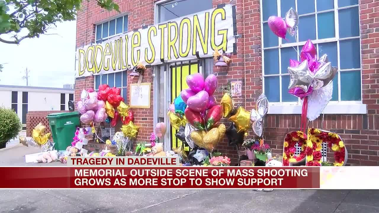 Memorial Outside Scene Of Mass Shooting Grows As More Stop To Show Support