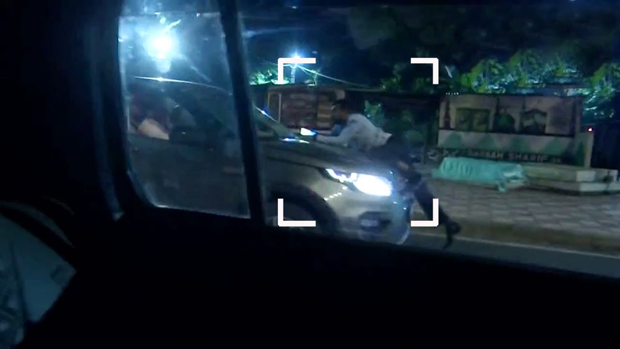 Watch: Man Seen Driving A Car With Another Person Hanging On The Bonnet For Around 2 3 Km In Delhi | Econ Times