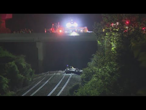 1 Dead After Car Lands On Train Tracks