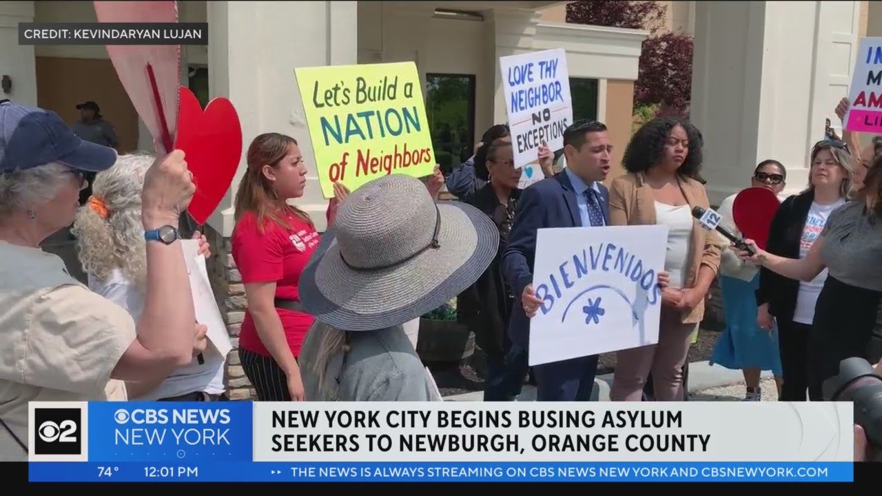 Asylum Seekers Arrive To Group Of Supporters In Orange County