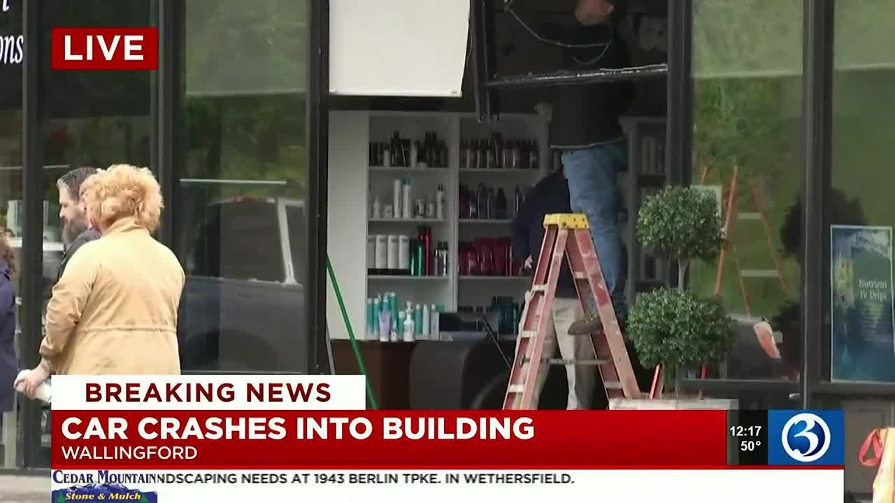 Car Crashes Into Building