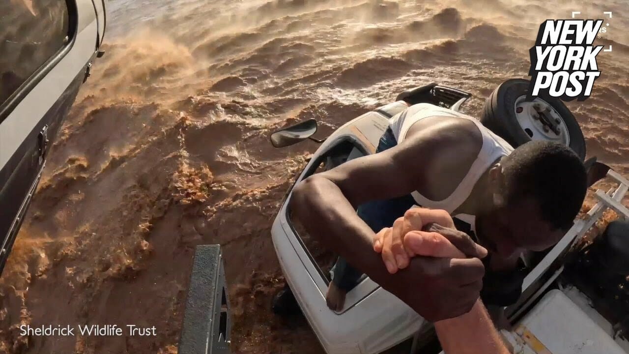 Dramatic Video Shows The Moment A Man Was Rescued From Rising Floods | New York Post