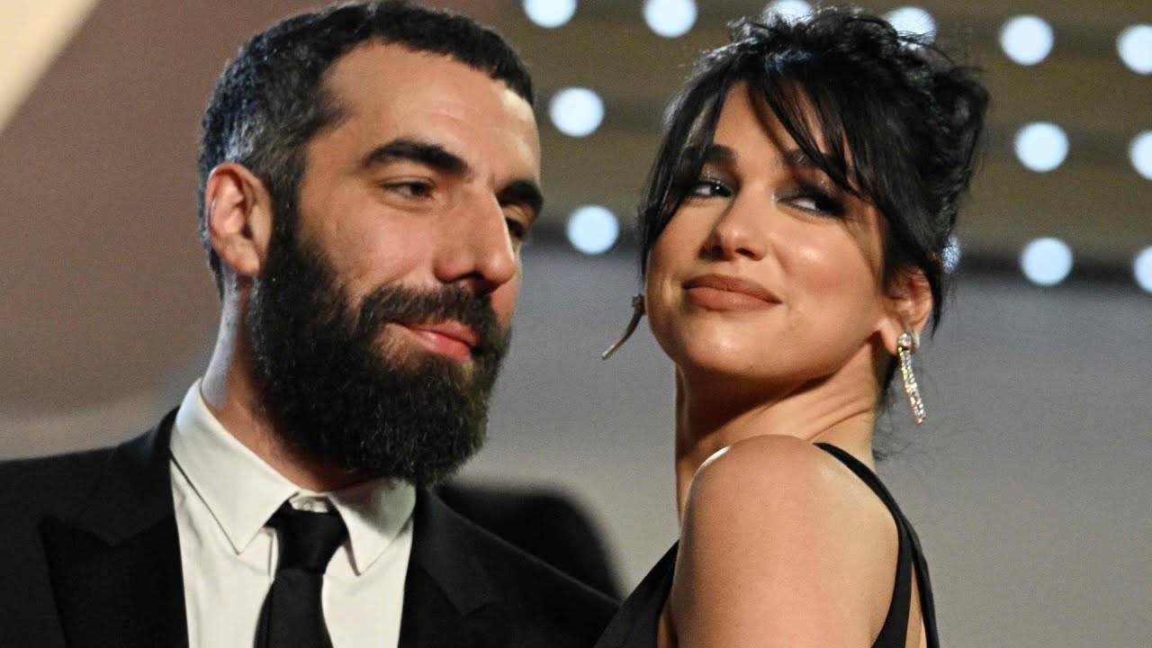 Dua Lipa & Romain Gavras Make Red Carpet Debut At Cannes Film Festival