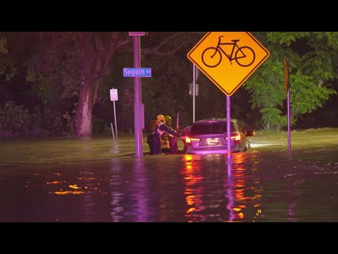 Firefighters Rescue Woman Trapped Inside Car In Fast Moving High Water