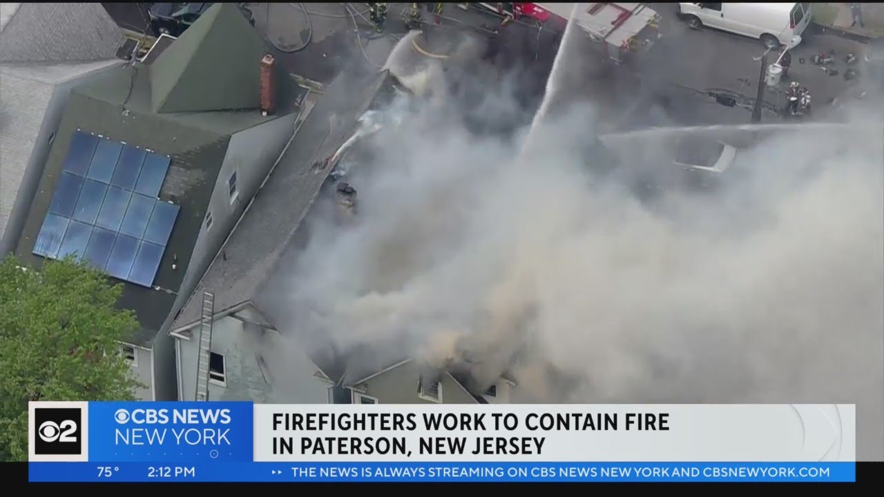 Firefighters Work To Contain Fire In Paterson, N.j.