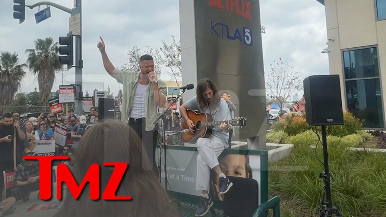 Imagine Dragons Performs Acoustic Concert For Striking Writers Outside Netflix | Tmz