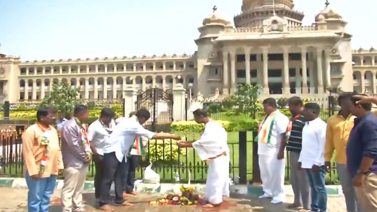 Karnataka Congress Workers ‘purify’ Vidhana Soudha By Sprinkling Cow Urine Before First Session | Econ Times