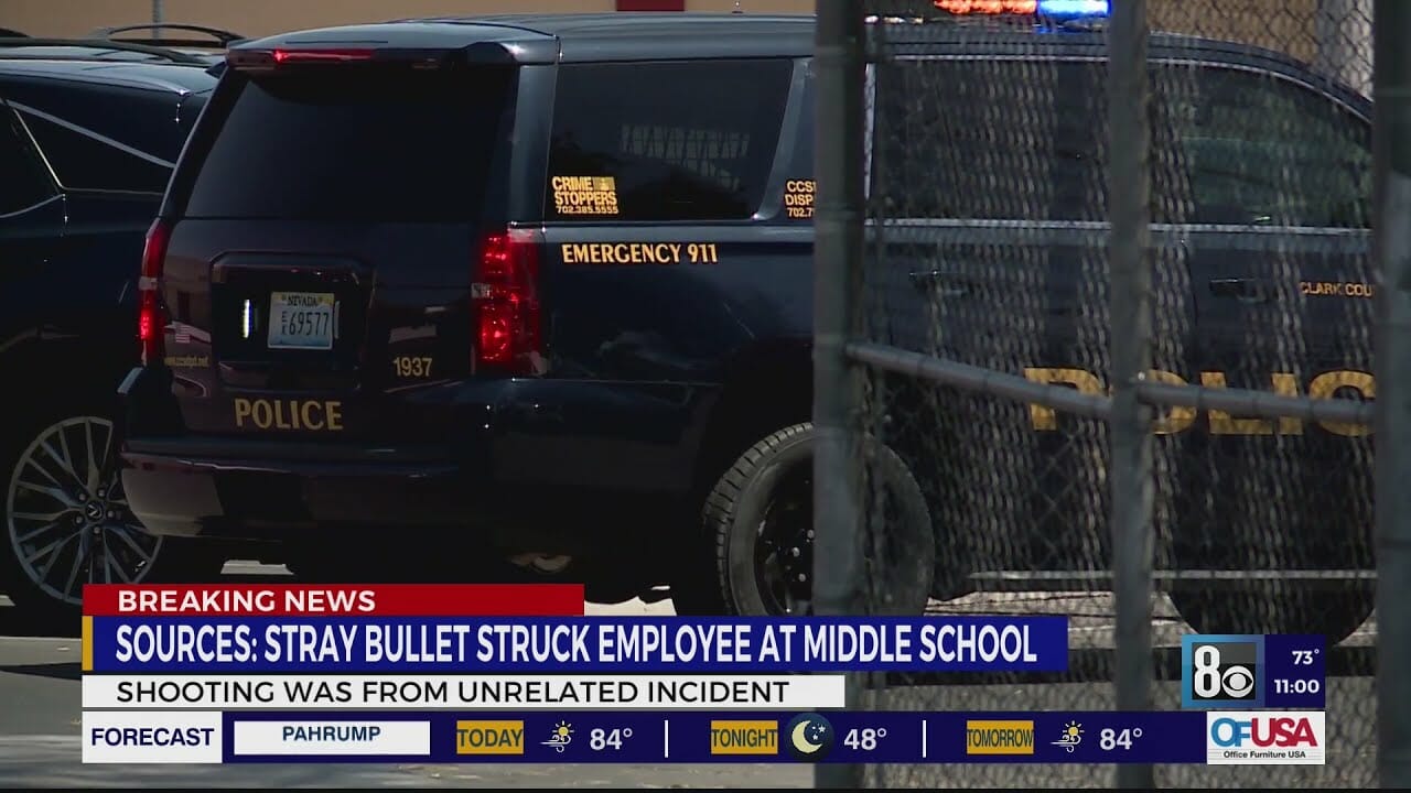 Las Vegas school monitor possibly struck by stray bullet: sources