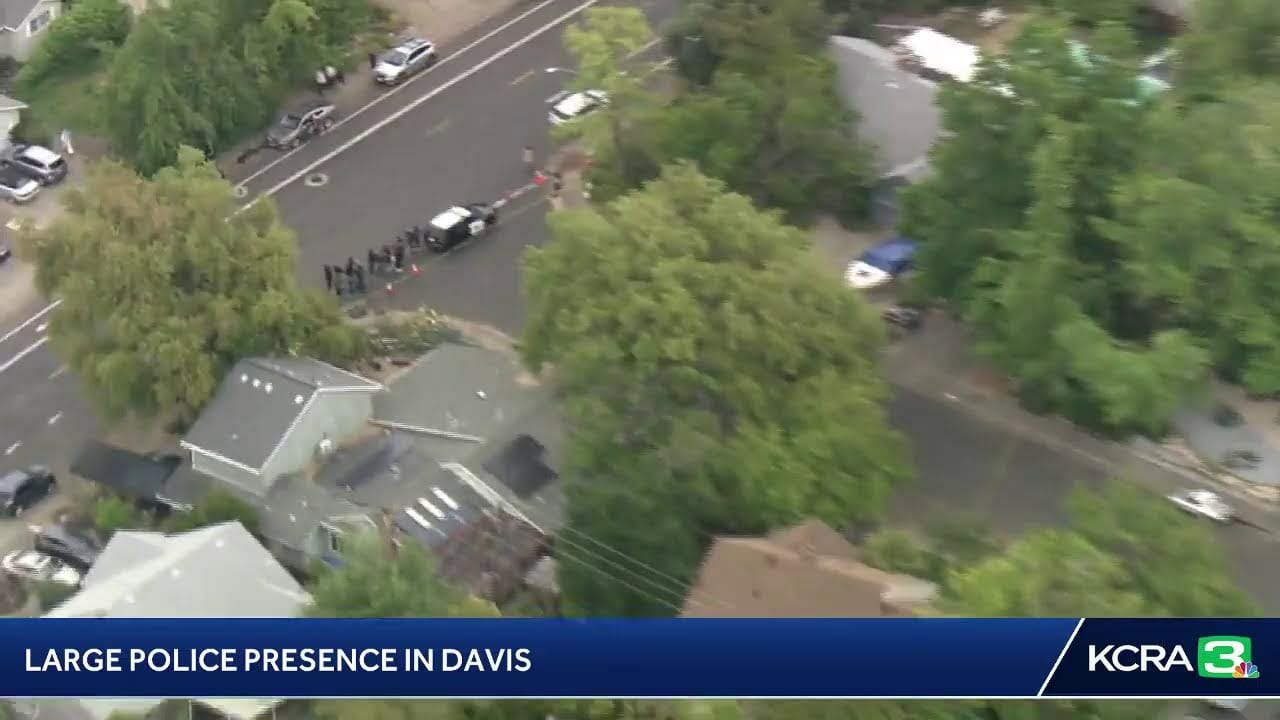 Livecopter 3 Is Hovering Over A Davis Home That Is Surrounded By Police Officers