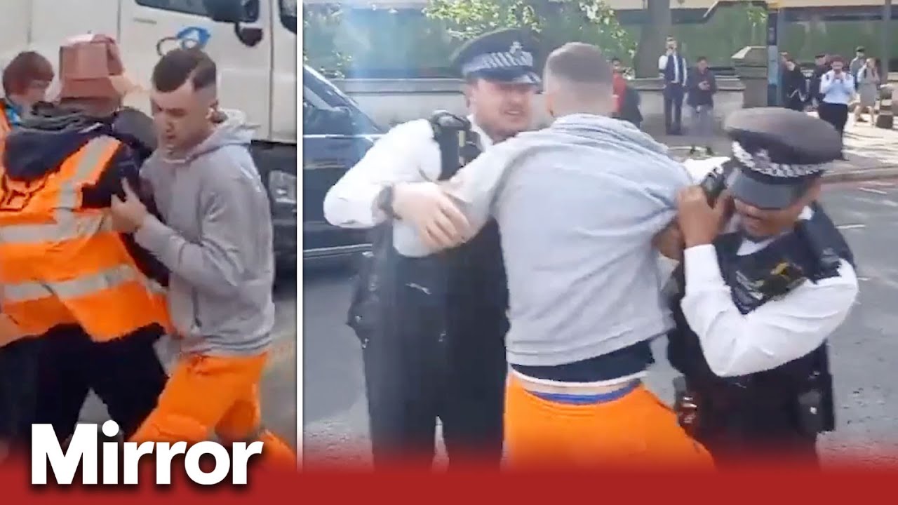 Man Handcuffed After Interfering With Protest | Uk News