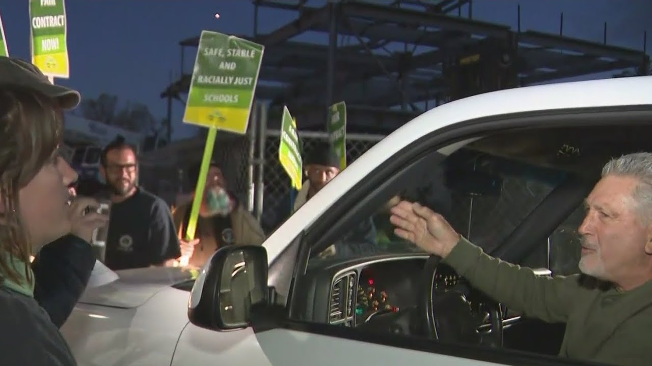 Oakland teachers confront contractor outside administrative building construction site