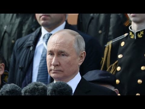 Putin Watches Smaller Than Usual Military Parade