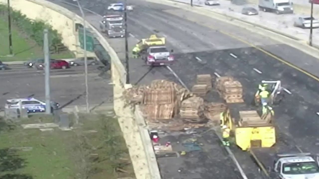 Semi Overturns, Spills 150 Wooden Pallets Onto I 4 In Orange County