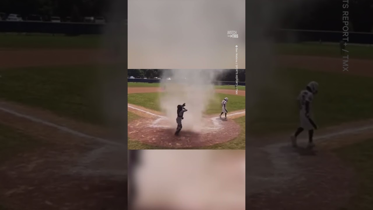 Umpire Saves Kid From Sudden Dust Devil During Fl Baseball Game