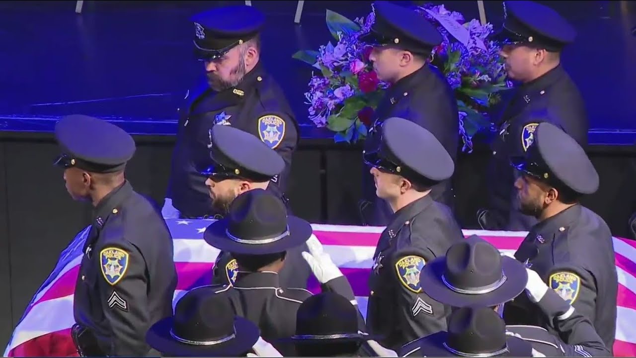 Honor Guard Enters Church To Open Public Funeral Of Officer Tuan Le