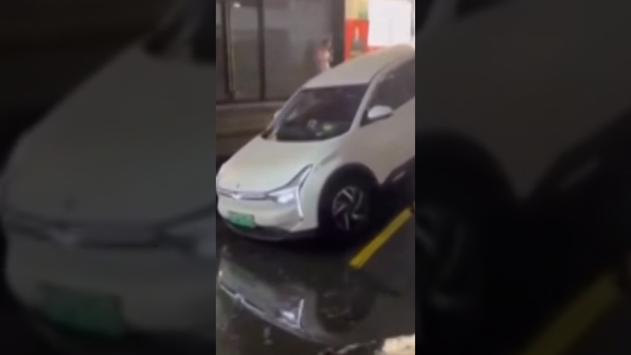 Sewage Filled Sinkhole Nearly Claims Car On Shanghai Street